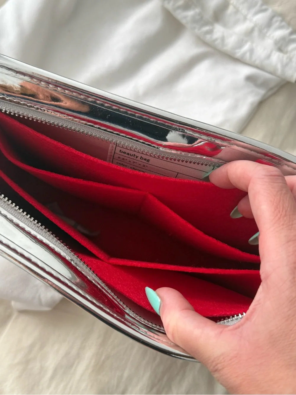 Limited Glossier Chrome make-up bag